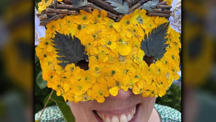 Lady Wearing A Mask to look like a bee