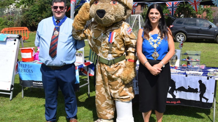 Mayor Kath Hay with a military charity mascot